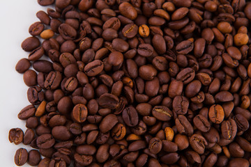roasted coffee beans on a white background