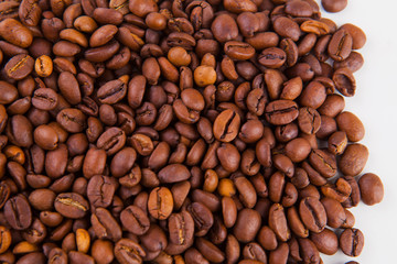 roasted coffee beans on a white background