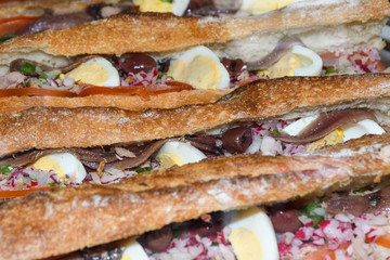 Tuna nicoise sandwich, also known as pan bagnat. The pan bagnat is a sandwich