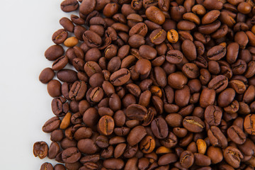 roasted coffee beans on a white background