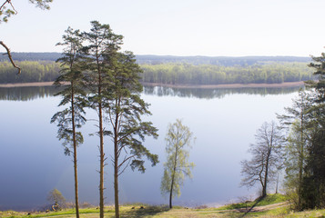Obraz premium Very beautiful landscape from the hill Ladakalnis. View of the lake with reflection in the water