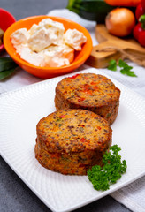 Tasty vegetarian food, burgers with Greek feta cheese, sweet red paprika, green olives and zucchini
