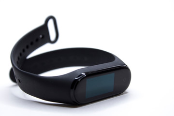 Fitness wrist bracelet. Modern technologies for monitoring health. Electronic watch with interchangeable bracelet. Icholated on a white background.