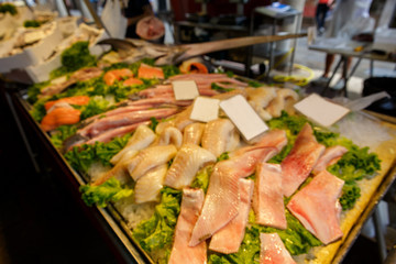 Fresh fish in fish market. Unfocused image