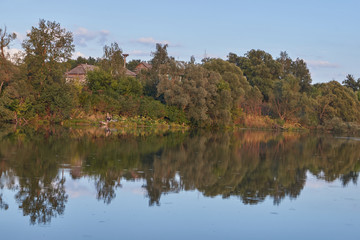 Fototapeta na wymiar Fishing on the lake in the village of Dronovo.