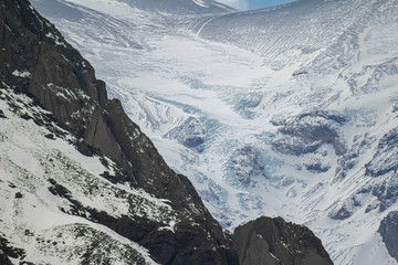 Closeup of a glacier, snow and rocks of San José vulcano viewed from Lo Valdés Valley, Cajón del...
