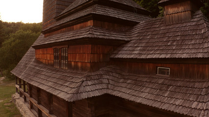 Close-up wooden church. Brown wooden roof.