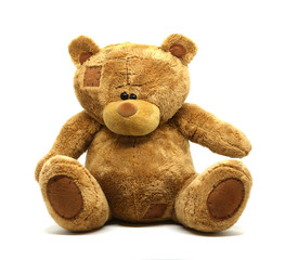 Brown teddy bear on a white background