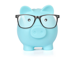 Piggy bank in glasses isolated