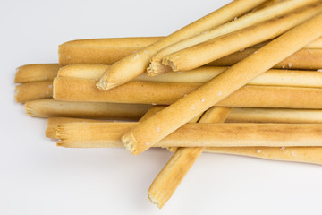 heap of mediterranean grissini bread sticks with salt