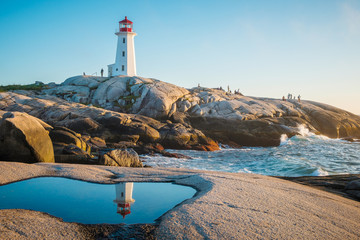 Peggy's Cove: Nova Scotia Landscape. Lighthouse reflection - obrazy, fototapety, plakaty
