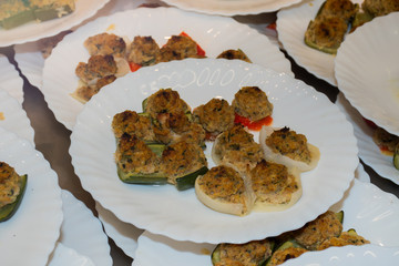 Stuffed peppers, tomatoes or courgettes are called Petit Farcis in French.