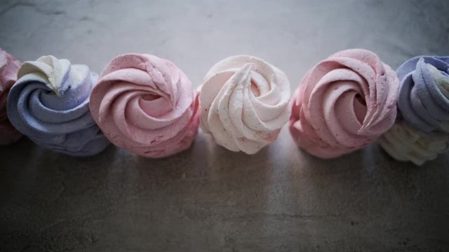 Row of delicious homemade marshmallow on gray textured background