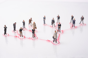 Plakat business miniature people on circle connect with line arrow, red line connect by circle point , abstract people on complex network connection and communication, people teamwork concept