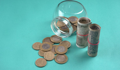 Jar of coins and money. Money saving financial concept, Money Growth.
