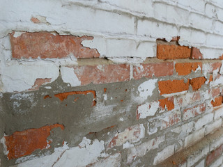 texture of white bricks of an old fried wall
