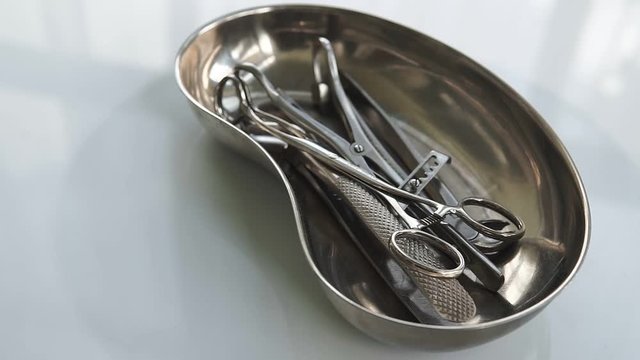 Dental appliances in sterile packaging on white background. Rotating.