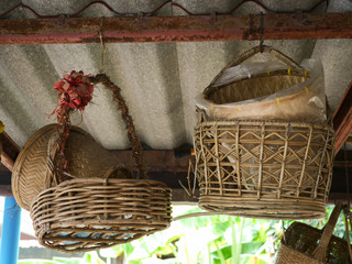 Old multi-purpose basket that is stored under the house roof