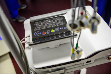 EKG monitor at ICU in hospital with sensors