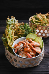 Crispy deep fried morning glory with spicy shrimp salad.