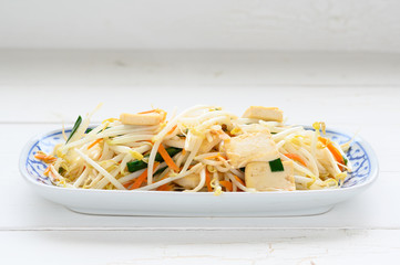 Stir Fried Bean Sprouts with tofu and scallion. Asian vegetable stir fry