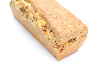 Homemade healthy bread made with spelt, gouda cheese and yeast, bread is imperfect but homemade and on a white background, the cheese is clearly visible within the bread