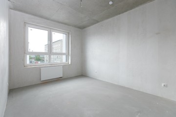 interior of the apartment without decoration in gray colors
