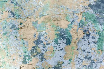 Textuur, achtergrond van de oude betonnen muur met scheuren en afbladderende verf