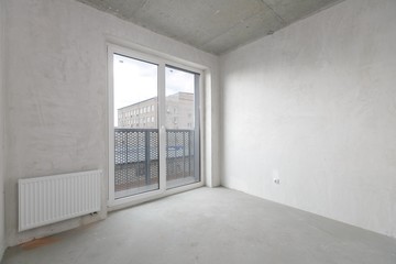 interior of the apartment without decoration in gray colors