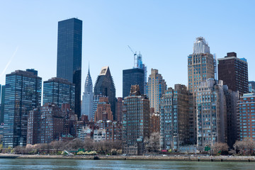 Fototapeta na wymiar Skyline of Midtown Manhattan during Spring along the East River in New York City