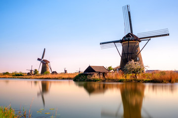 windmills in holland on a sunny day
