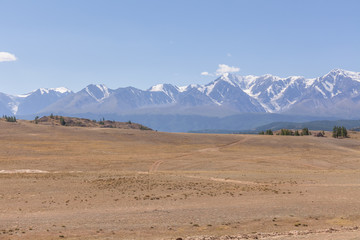 Fototapeta na wymiar View of Belukha Mountain. Russia. Belukha Mountain is part of the World Heritage Site entitled Golden Mountains of Altai.