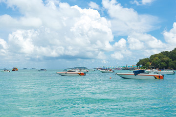 Speedboats standby for tourists on the beach