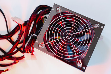 Power supply Electronics technology concept white background details blue red light