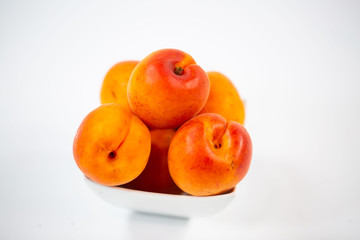 fresch apricots on white background