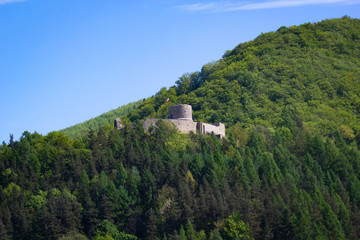 Fototapeta na wymiar Medieval Castle in village Rytro in may. Beskid Sadecki Mountains, Poland.
