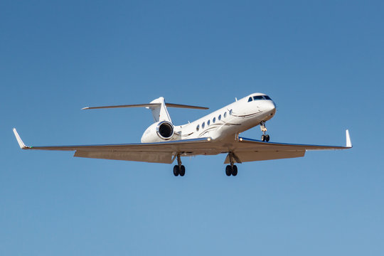 Moscow, Russia - April 03, 2019: Aircraft Gulfstream G550 D-AGVA of Luxaviation airline going to landing against blue sky at Vnukovo international airport in Moscow at sunny day