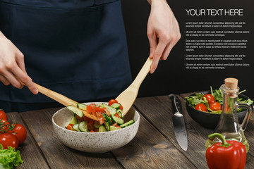 Woman mixing fresh vegetable salad. Female hands. Diet concept for healthy lifestyle with sample text.