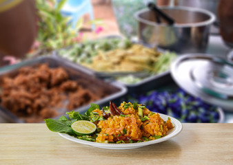 Fermented Pork and Crisp Rice Salad or Yam Naem Khao Tod Recipe,Thai food concept.Blur food background.