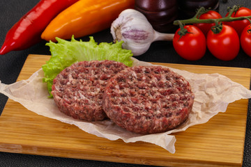 Raw burger cutlet