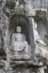 Fototapeta na wymiar Sculpture bouddhiste du temple de Lingyin à Hangzhou, Chine 