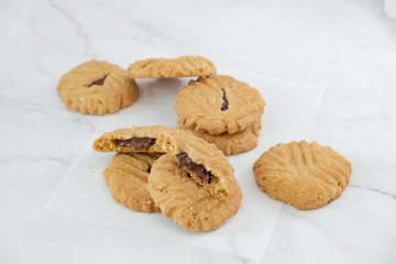 Group of homemade chocolate cookies and space for text on marble background
