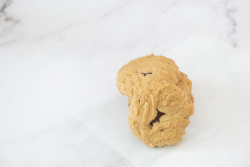 Group of homemade chocolate cookies and space for text on marble background