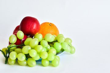 Healthy lifestyle, healthy eating. Fruit on a white background. Fitness, sport, weight loss concept. Space for text.