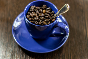 cup of coffee with beans