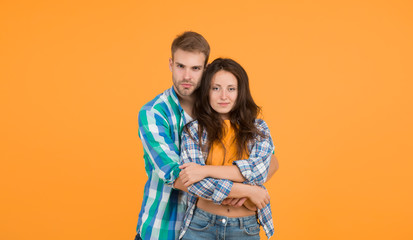 Fototapeta premium Carefree students hang out together. Summer season. Fashion clothes shop. Modern couple. Love and romance. Man and girl. Couple in love. Sexy couple checkered shirts. Family look. Matching outfits