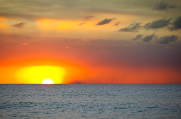 Fototapeta premium Island Of Redonda With Colorful Sunset, Antigua