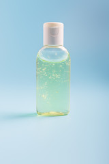  antiseptic gel on a blue background. concept of protection against coronavirus during a pandemic and quarantine.