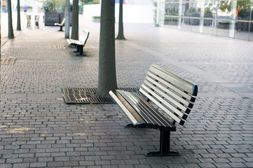 Improvement of public space. Bus station place for waiting. Urban bench or seat. City bench with...