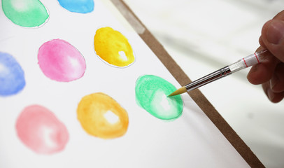 close up junior Artist draw and pant ball by water color, water color paining class